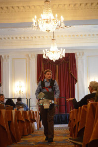 Figure 2: Tim Morin walks in transects to capture ceiling features in the conference room