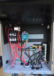 Inside the circuit breaker panel: power distribution.